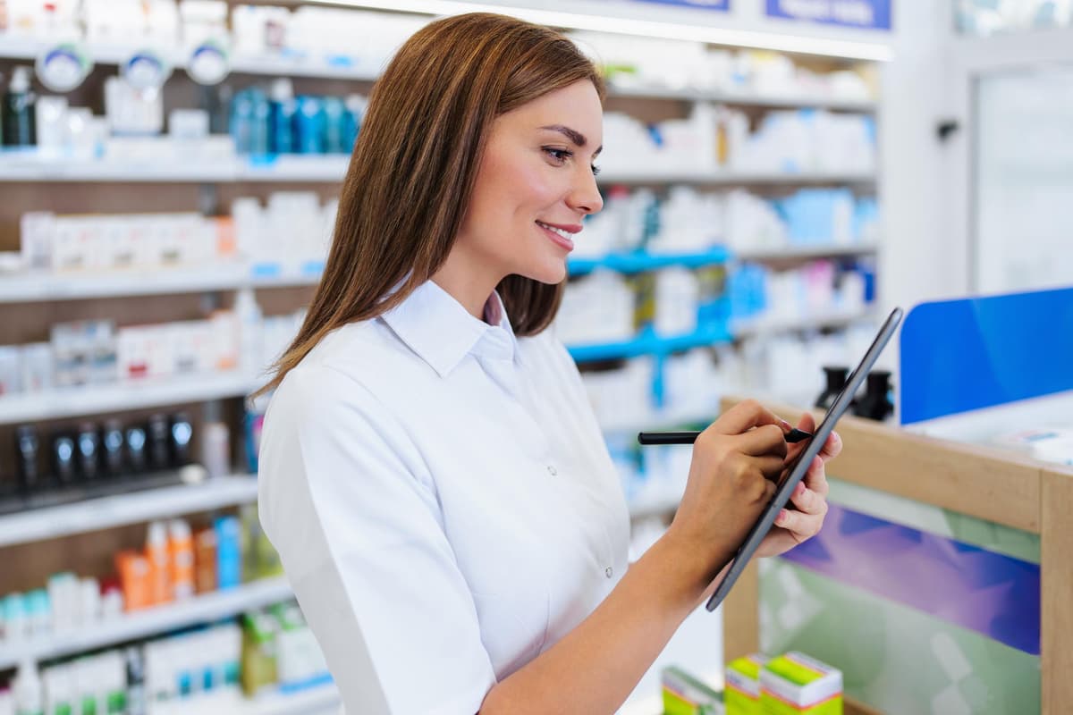 Healthcare professional checking medicine shortage information